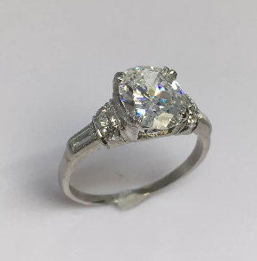  Nobel Antique jewelry . Art deco diamond engagement ring